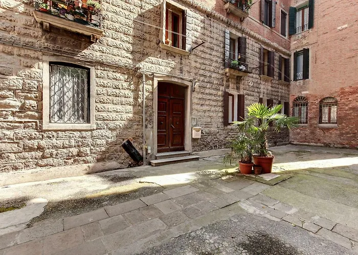 White Flowers With Canal View By Wonderful Italy